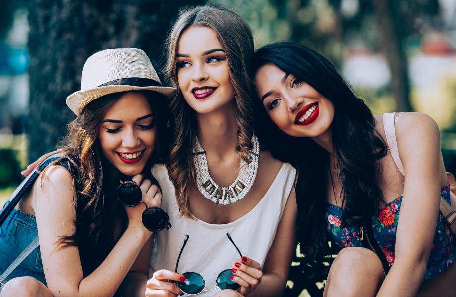 Women smiling after teeth whitening.