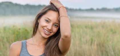 Woman smiling with dental veneers