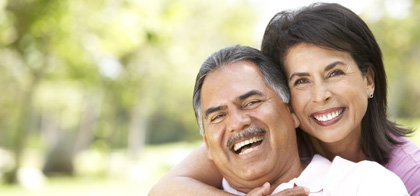 Couple with dental veneers smiling