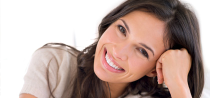 Woman smiling after teeth whitening