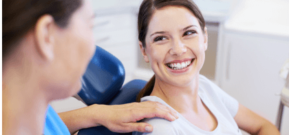 woman at dentist smiling