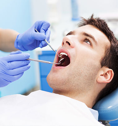 man receiving dental care