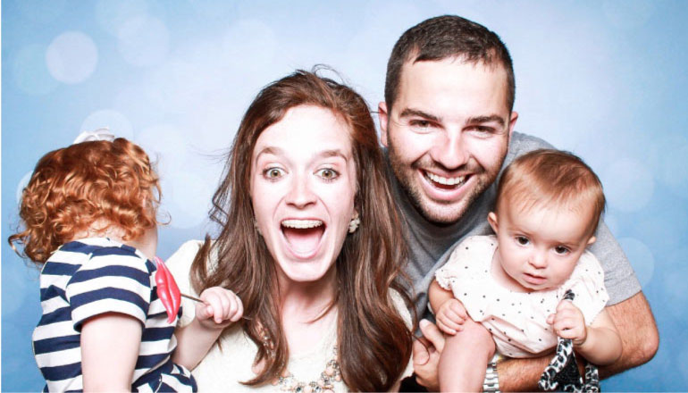 family of four happy to be going to a family dentist